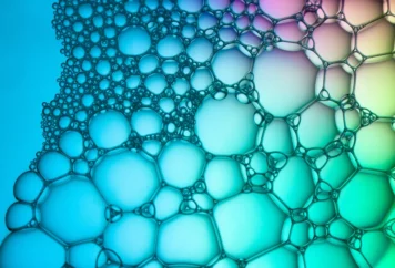 Cholesteric gratings induced by electric field in mixtures of liquid crystal and novel chiral ionic liquid Cholesteric gratings induced by electric field in mixtures of liquid crystal and novel chiral ionic liquid